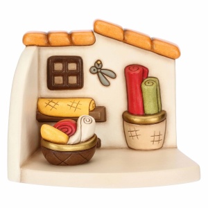 Bottega della sarta con cesti di stoffe in ceramica Presepe Classico -Thun